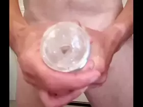 Moaning orgasm and filling my Fleshlight with a load of cum after handjob in bathroom